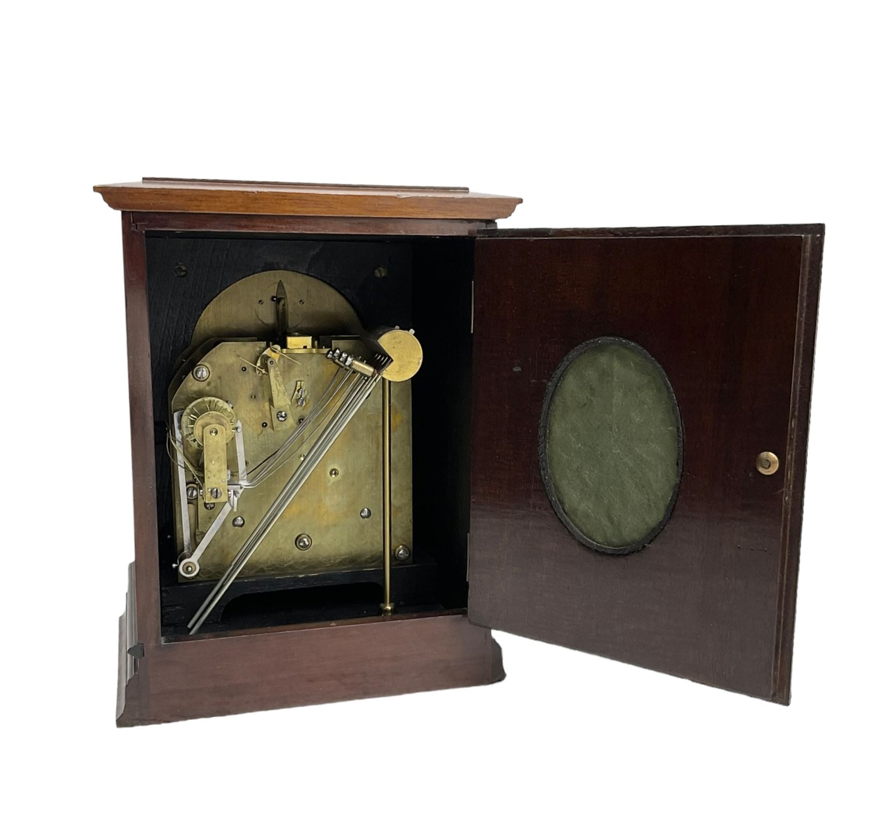 Continental early 20th century mahogany cased 8-day mantle clock, rectangular case with a flat top and fully glazed arched door to the silvered dial, separate chapter with Roman numerals, minute track and steel spade hands, subsidiary time regulation dial, with a twin train Westminster chiming movement, lever platform escapement and four gong rods. Retailed by James Ramsay, Dundee.