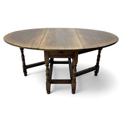 18th century oak dining table, oval drop-leaf top on gate-leg action base, turned supports united by turned stretchers, fitted with single end drawer