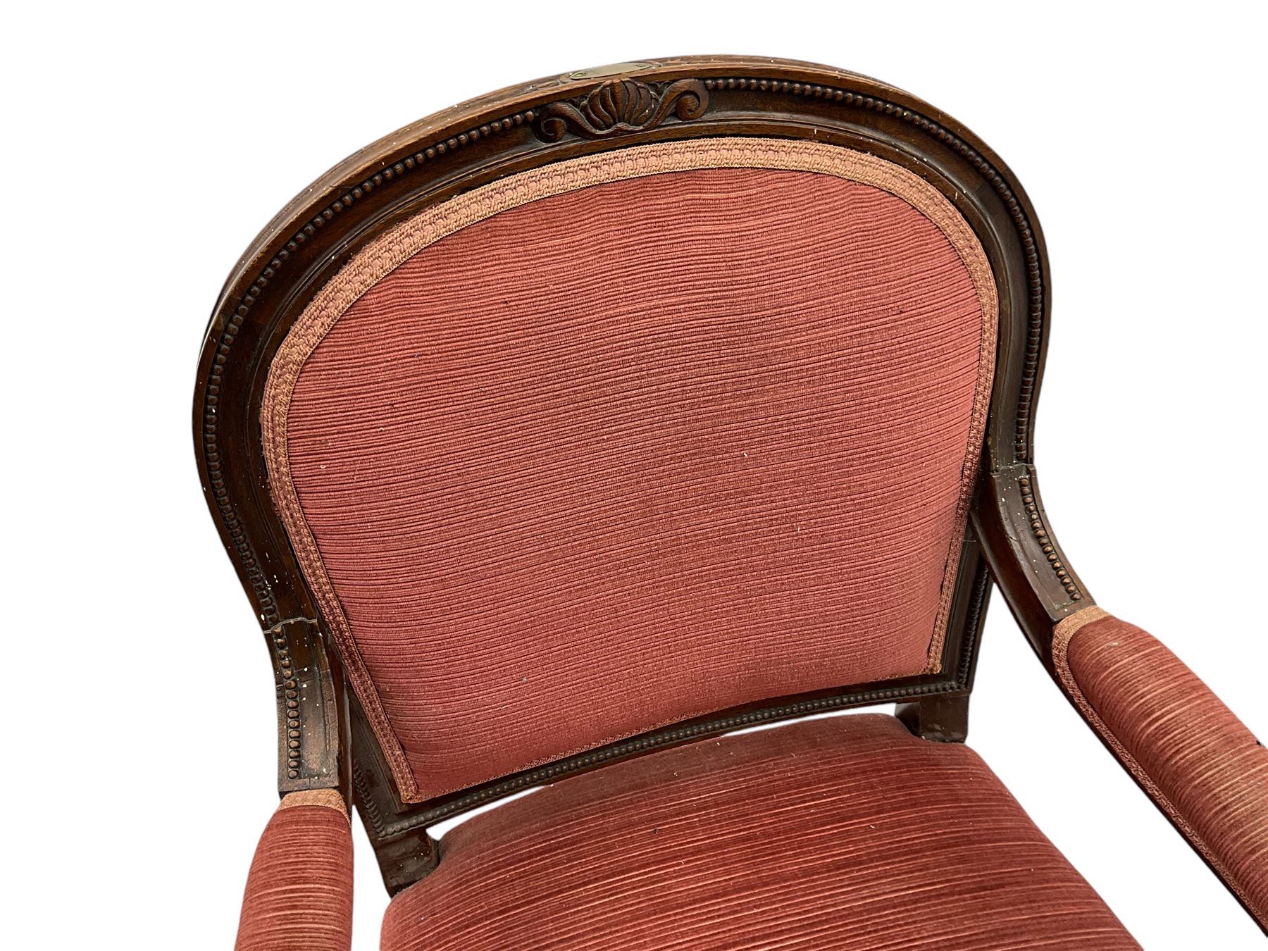 20th century French design mahogany fauteuil armchair, moulded and beaded framed, upholstered in pink fabric, rolled arms over acanthus leaf carved supports, on turned and fluted front supports united by curved X-framed stretcher 