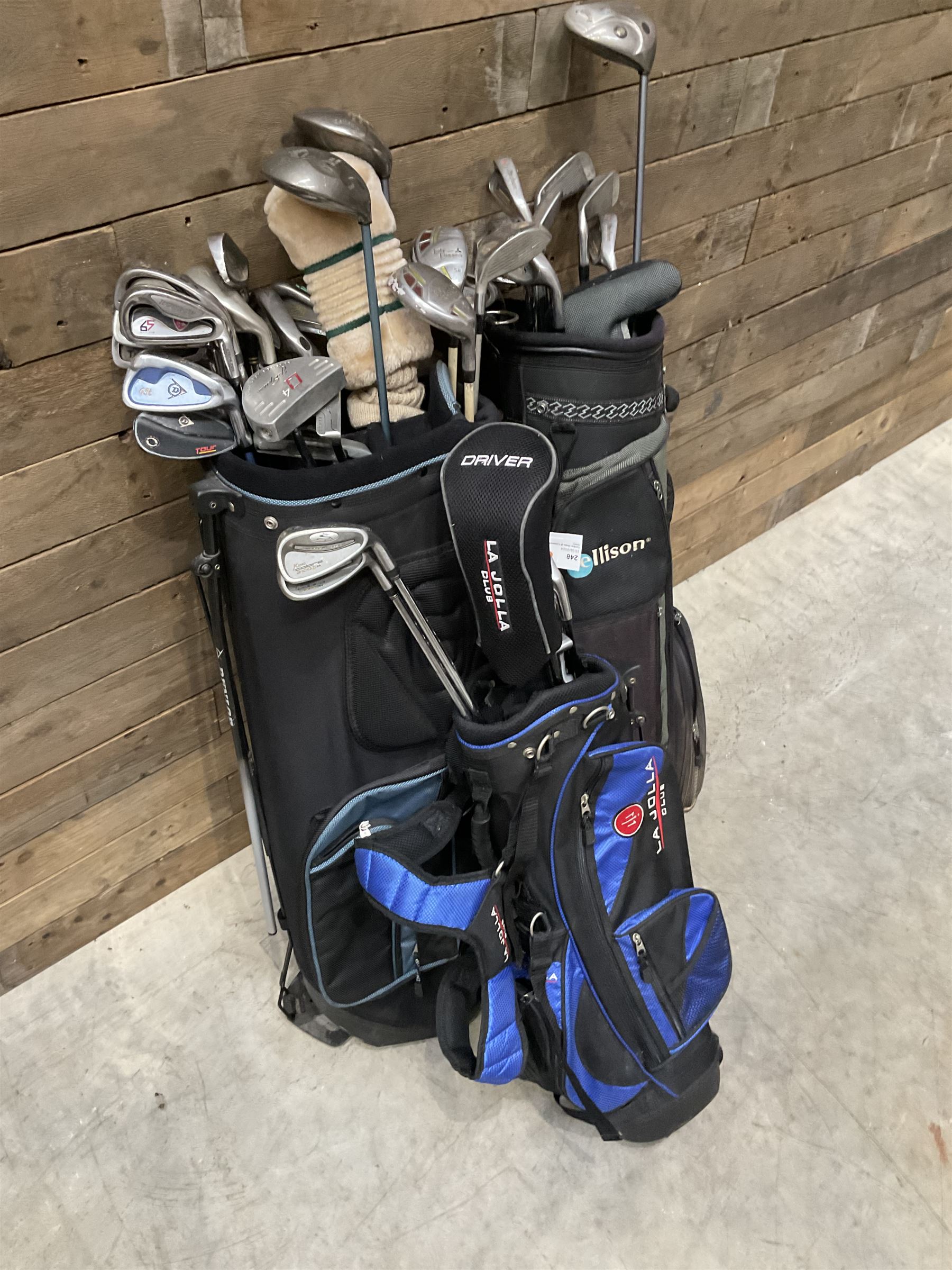 Battlesticks and other golf clubs in three bags