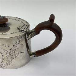 George III silver bachelors teapot, of oval form with wooden scroll handle and finial, the body chased with armorial crest and ribbon swag and foliate detail, hallmarked Samuel Godbehere & Edward Wigan, London 1793, including handle H9cm