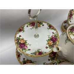 Royal Albert Country Roses pattern tea service for six, comprising Teapot, open sucurer, milk jug, cups and saucers, dessert plates and cake stand 