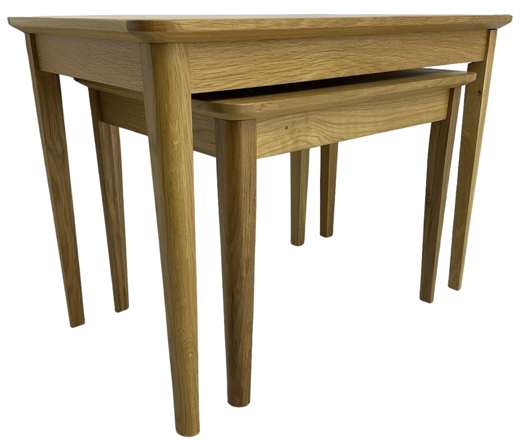 Contemporary light oak nest of two tables, rectangular top over tapering supports