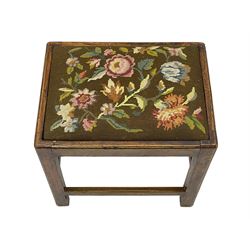 20th century mahogany rectangular footstool, needlework upholstered drop-in seat, on ball and claw carved feet (W81cm, D35cm, H34cm); 19th century elm stool, needlework upholstered drop-in seat, on square moulded supports united by plain stretchers (W45cm); 19th century walnut stool, shaped top upholstered in needlework, on cabriole supports (W50cm); 19th century rosewood stool, upholstered drop-in seat, on curved x-framed supports united by turned stretcher (W47cm)