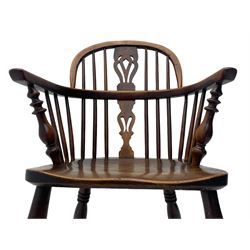 19th century yew wood and elm Windsor armchair, low double hoop stick and pierced splat back, dished seat on turned supports united by crinoline stretchers