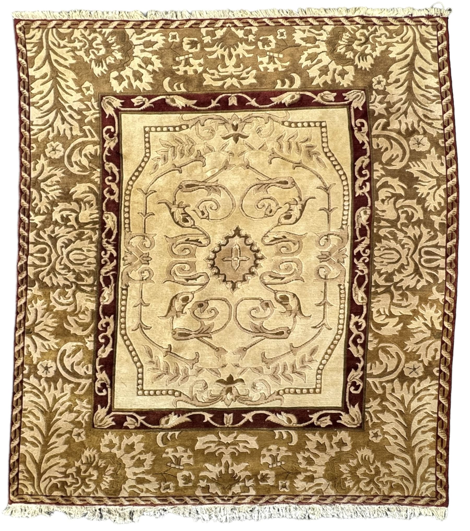 Persian Tabriz design beige ground rug, the field decorated with a central medallion featuring scroll and leaf motifs, surrounded by a burgundy frame with floral patterns, the main border showcasing a series of stylised floral and leaf designs in beige and brown tones, enclosed by an outer band with interlocking chain motifs