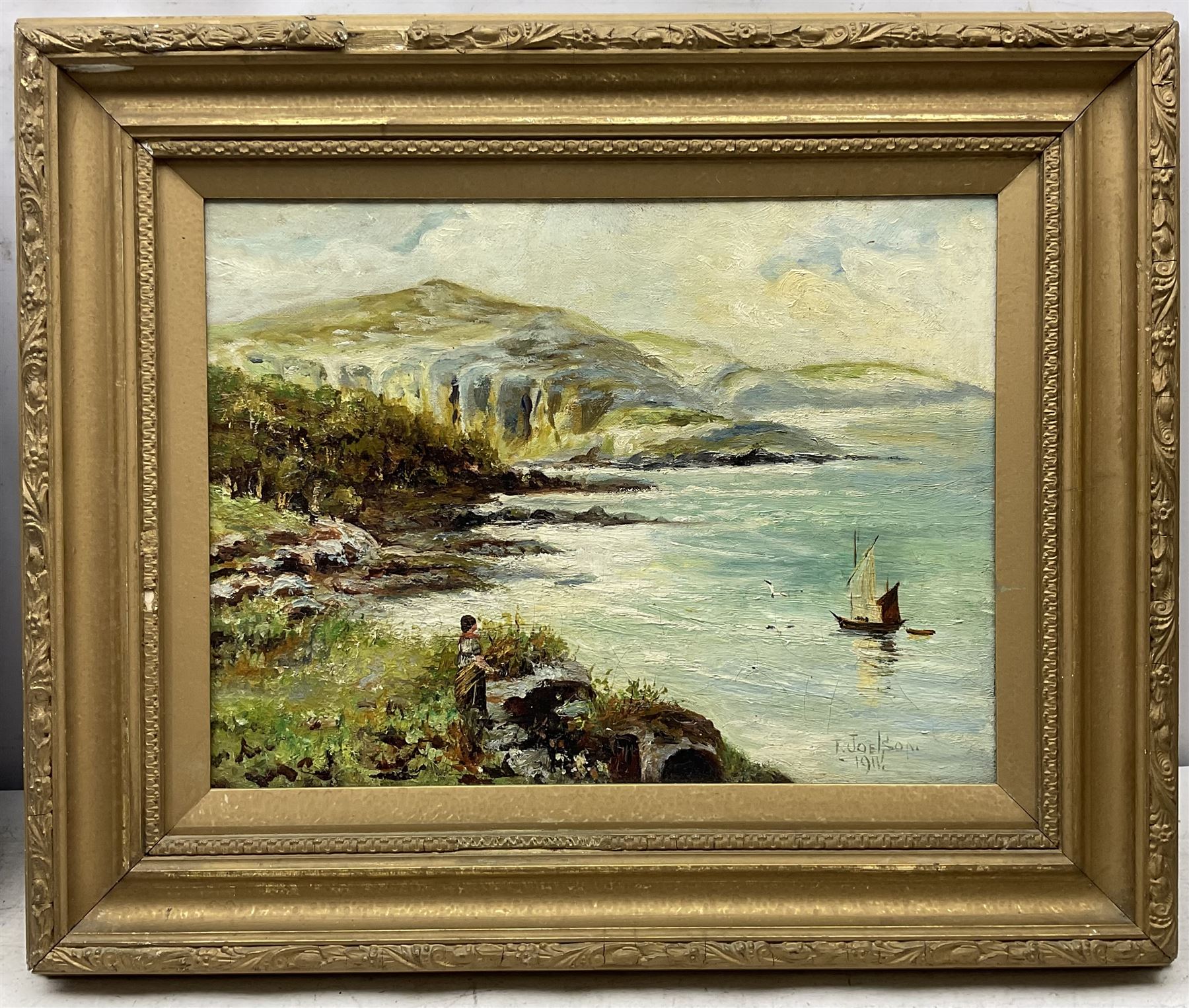 Watson (British early 20th century): Seascape, watercolour signed and dated 1910, 20cm x 34cm; T Joelson (British early 20th century): Coastal Seascape with Figure and Sailing Boat, oil on canvas signed and dated 1911, 30cm x 40cm (2)