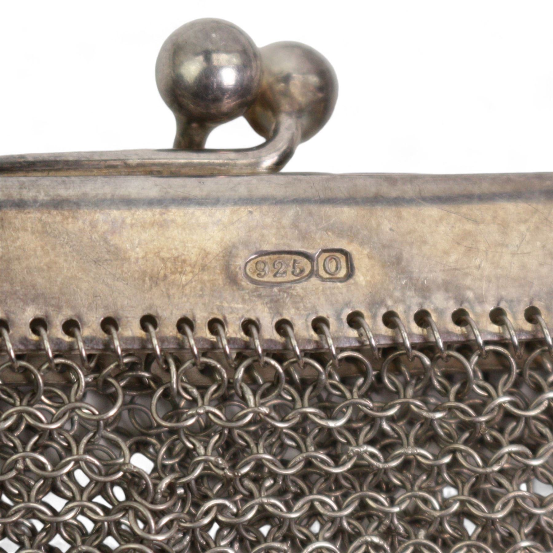 Silver mesh evening purse with long and short link strap, hallmarked import Birmingham 1913, together with an iron mesh evening purse with acorn drops, and a silver hair comb (3)