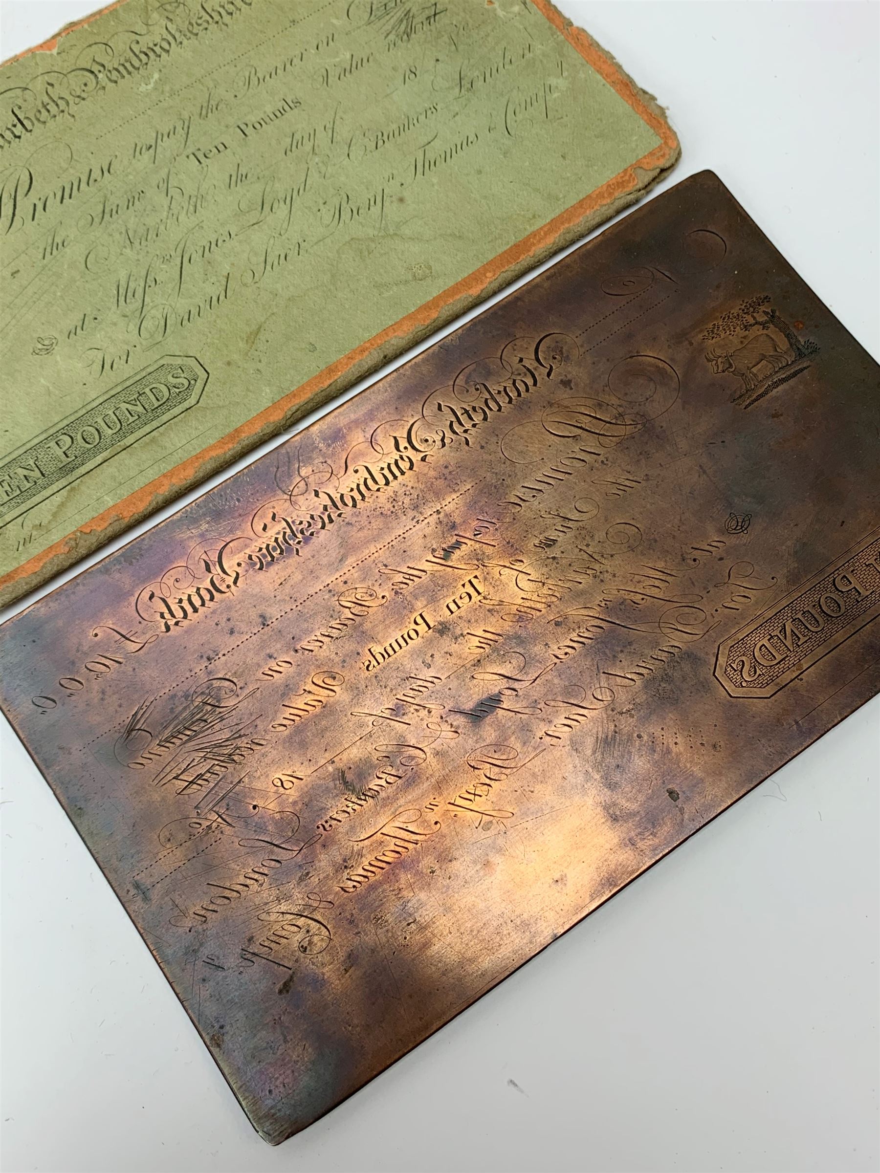 19th Century provincial Narbeth and Pembrokeshire bank copper banknote printing plate for ten pounds, housed in a card sleeve the front being printed with the banknote design 