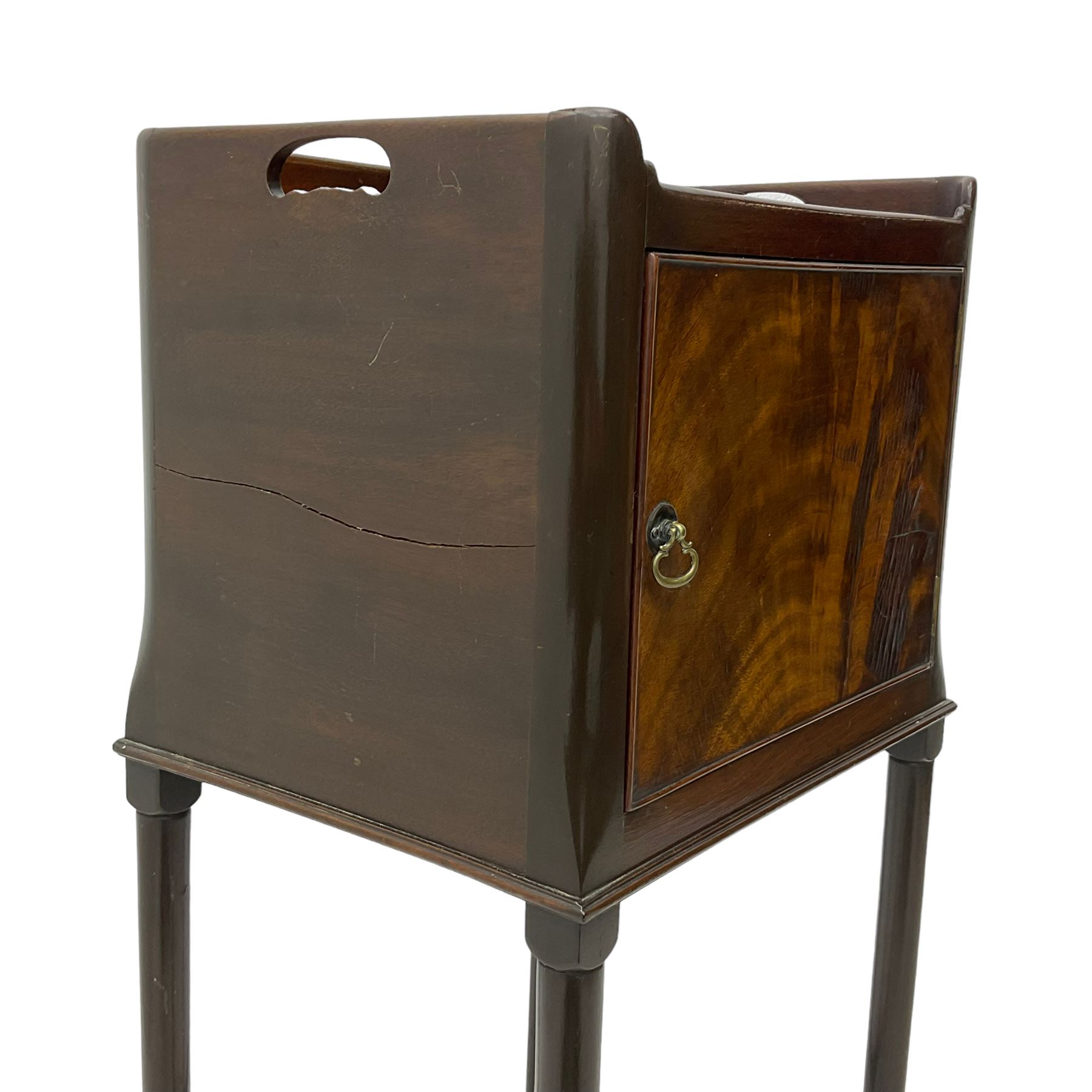 20th century Georgian design mahogany bedside pot cupboard, pierced tray top, enclosed by single figured door, on cabriole supports united by turned X-framed stretchers 