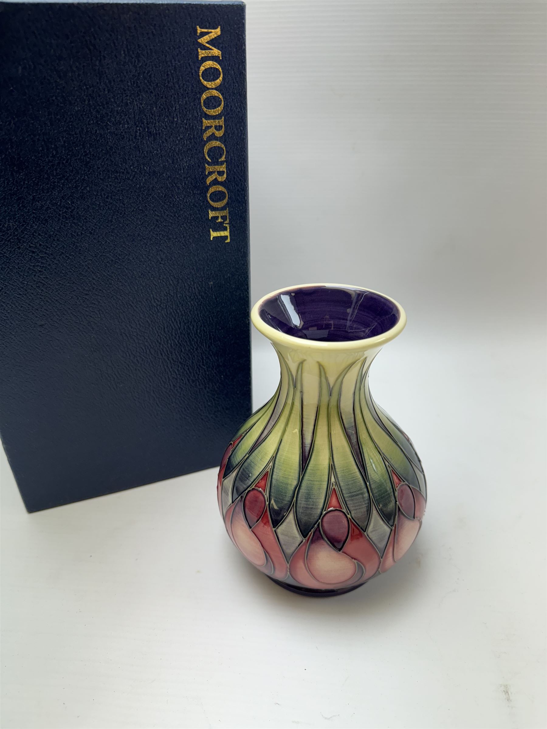 Moorcroft vase, decorated in April Tulip pattern, with markers mark beneath, with original box H16cm