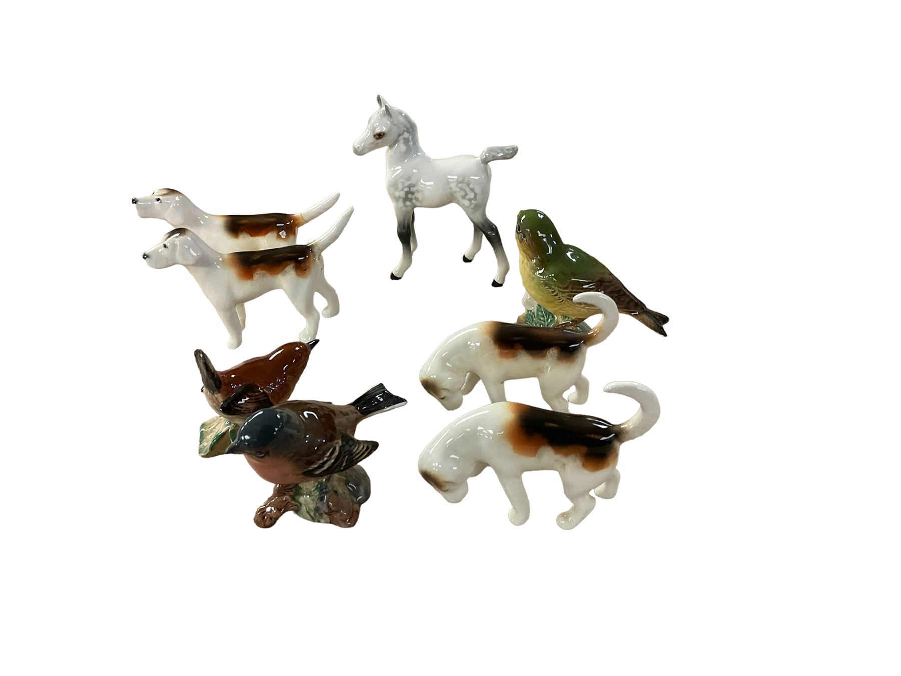 Collection of Beswick, including grey foal 1407, four hounds and three birds 