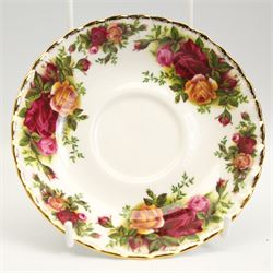 Royal Albert Old Country Roses dinner and tea ware comprising seven dinner plates, eight soup bowls, eight dessert bowls, teacups, saucers and tea plates, two sauce boats and stands, salt & pepper pots, milk jug, sugar bowl, rectangular dish, sandwich plate and oval platter 