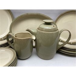 Denby tea and dinner wares, including bowls, jugs, tureens, side plates, dinner plates, serving dishes, cups and saucers, coffee pot, etc, all decorated with a green and brown mottled glaze, with printed marks beneath, in two boxes 