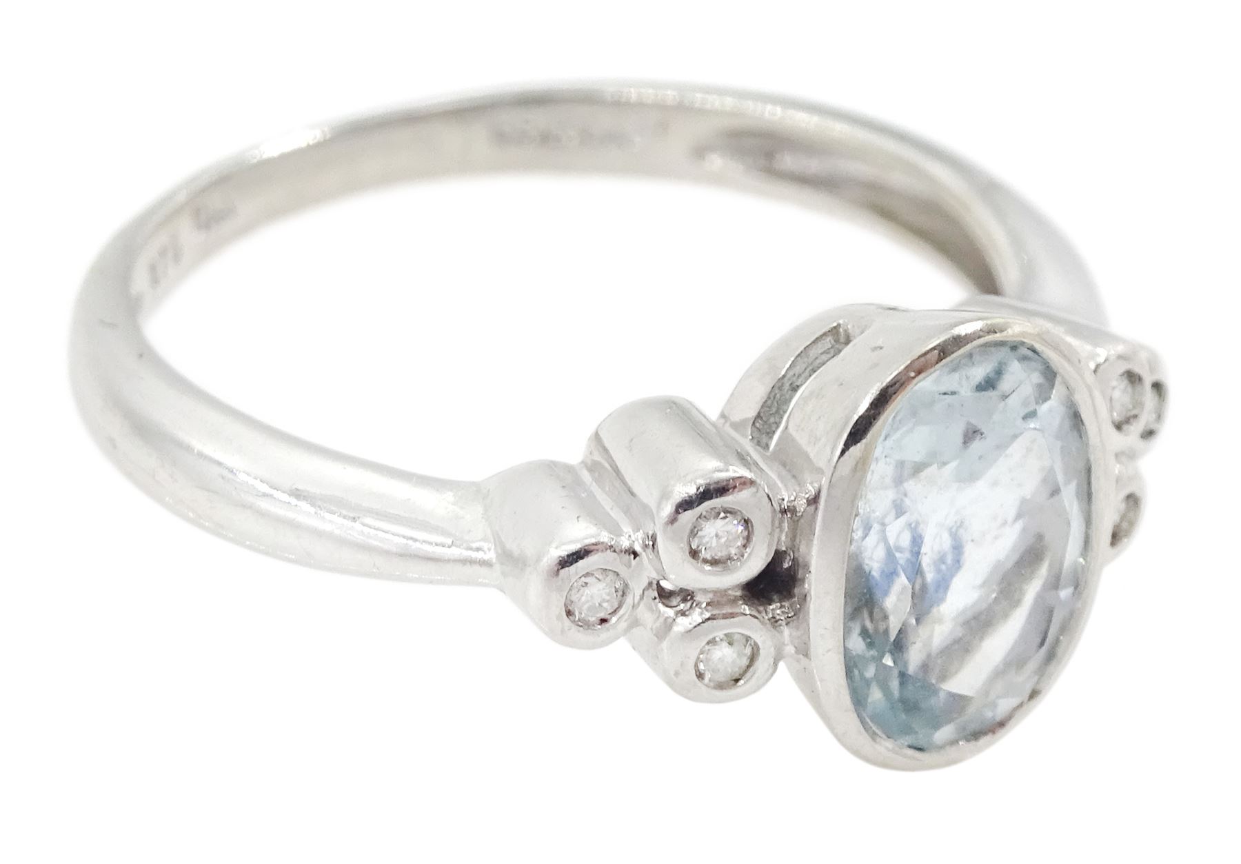 9ct white gold oval aquamarine and round brilliant cut diamond ring, hallmarked