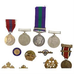 General Service Medal 1918-62, with Palestine 1945-48 clasp, awarded to 14124180 Sjt R.J. Foster R. SIGS, together with WWII George VI Defence medal and War medal, various cap badges etc 