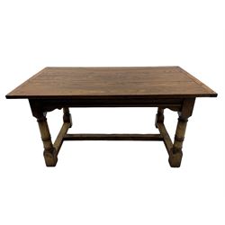 Oak refectory dining table, rectangular three plank top with cleated ends, two additional leaves, on turned supports united by H-stretchers 