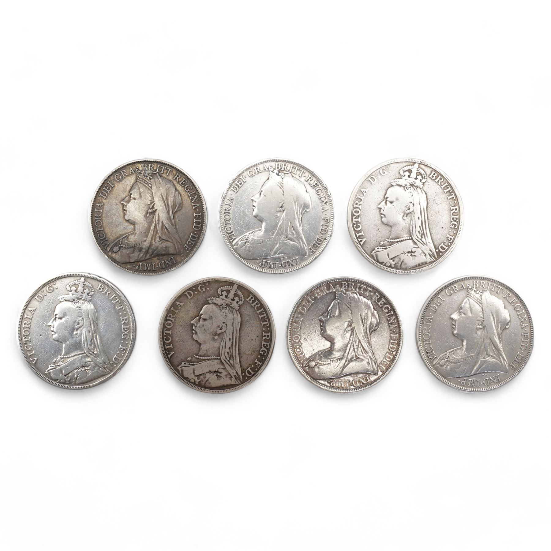 Seven Queen Victoria silver crown coins, dated two 1890, 1891, 1893, 1896, 1898 and 1900