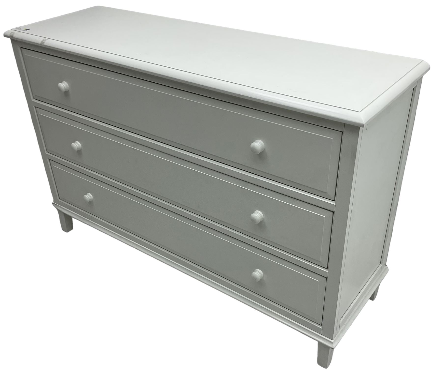 Contemporary wide white painted straight-front chest, fitted with three drawers