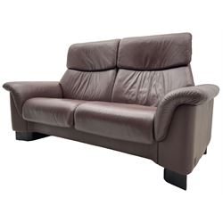 Ekornes Stressless - three-seat sofa upholstered in chocolate brown leather, with high backrests, cushioned headrests, and manual reclining mechanism (L248cm, D84cm, H102cm); with matching two-seat sofa (L184cm, D84cm, H102cm)