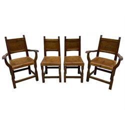 Gnomeman - set of eight (6+2) oak dining chairs, adzed panelled back over tan leather upholstered seat with applied stud band, on square supports united by plain stretchers, each chair carved with gnome signature, by Thomas Whittaker, Littlebeck, Whitby