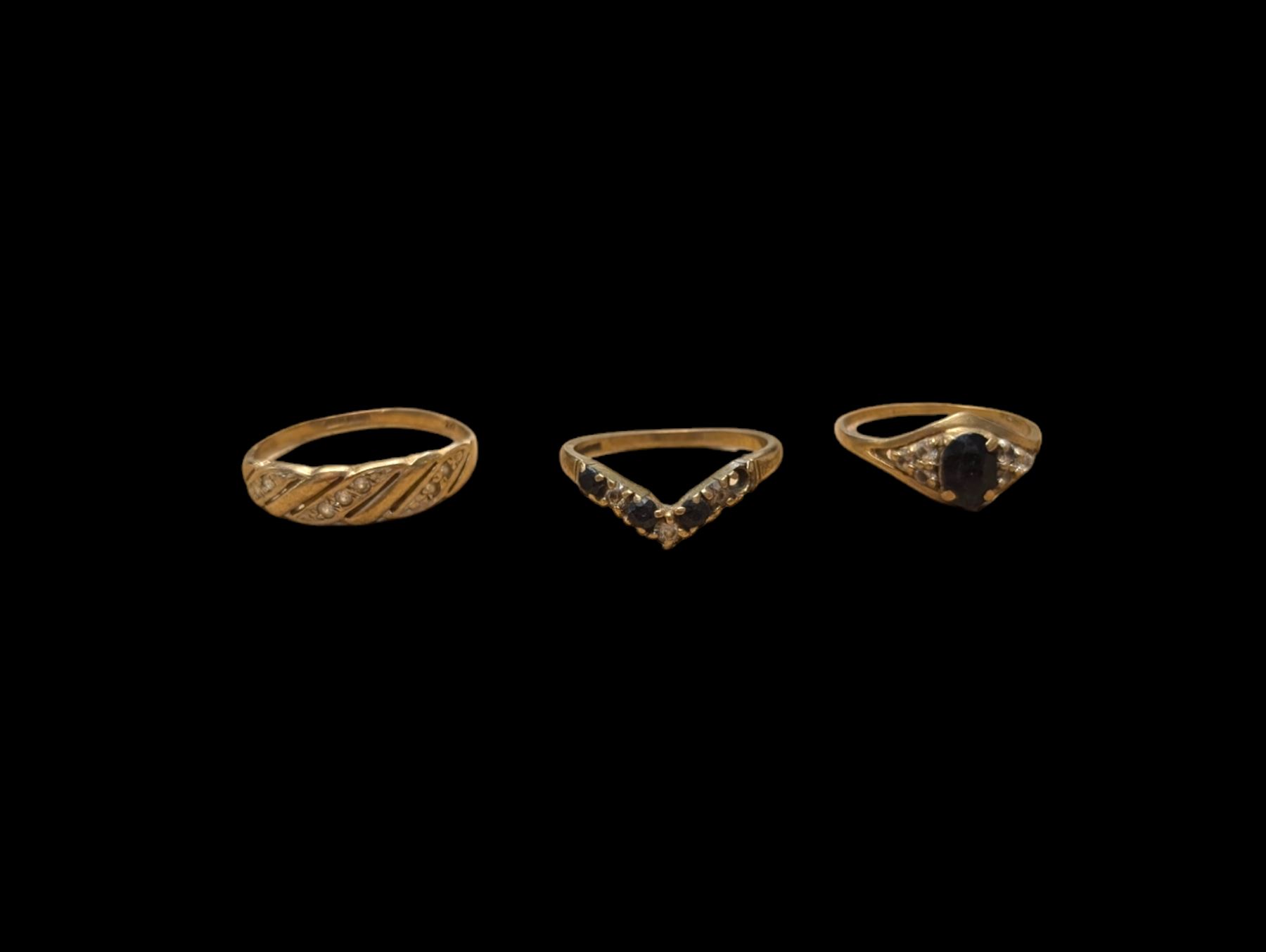 Three 9ct gold stone set rings, all hallmarked 