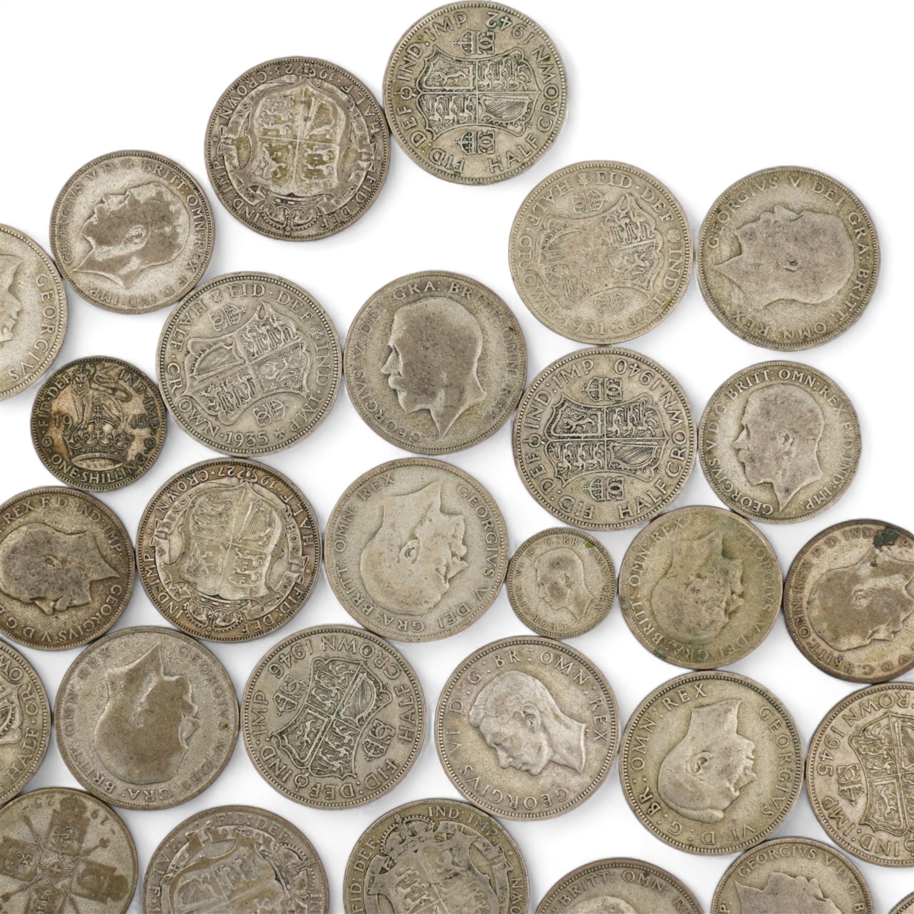 Approximately 610 grams of Great British pre 1947 silver coins, including shillings, florins, halfcrowns etc