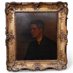 Henry Keyworth Raine (British 1872-1934): Portrait of a Young Gentleman in a Black Suit and Tie, oil on canvas signed and dated 1914, in ornate swept gilt frame with shell motifs 67cm x 58cm 