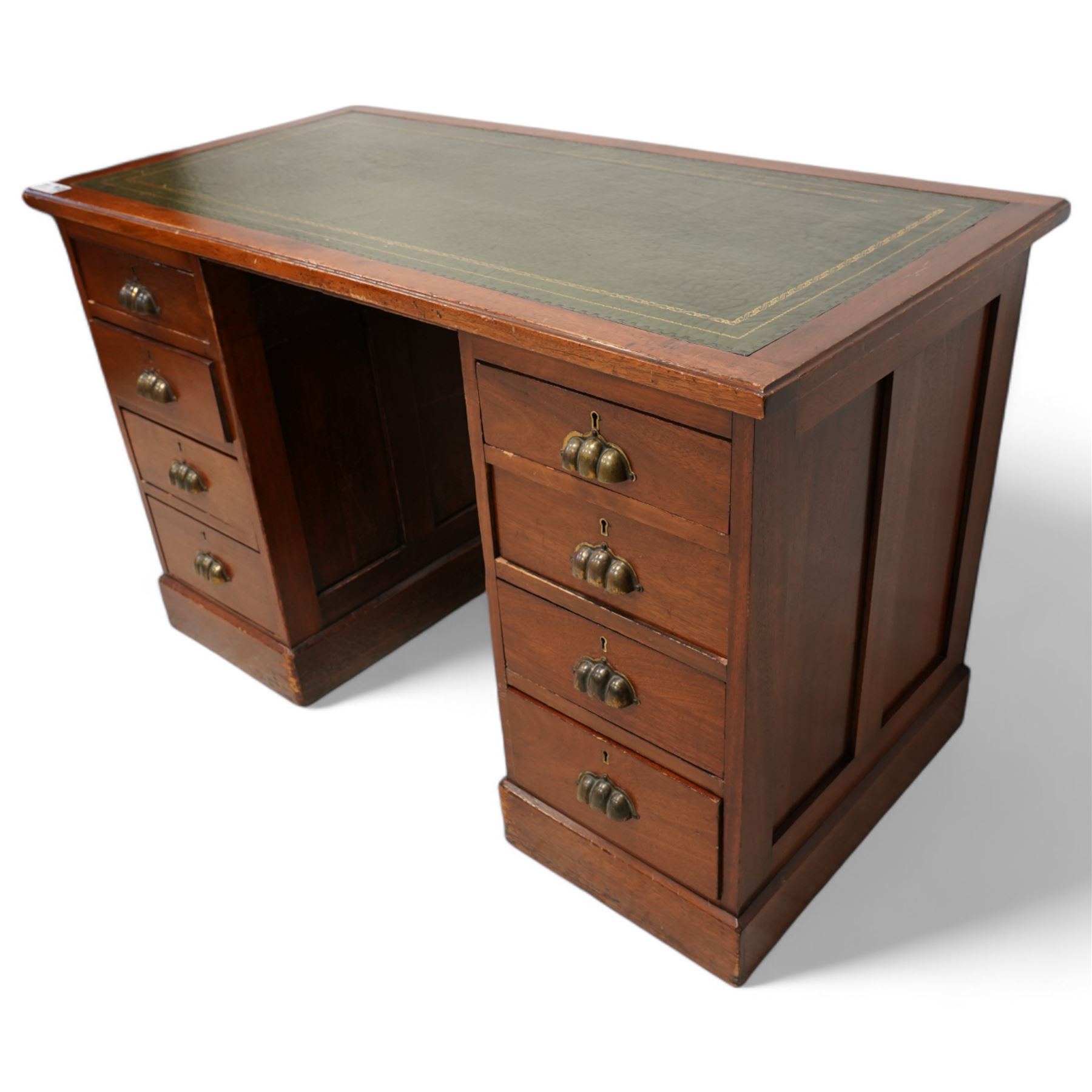 Early 20th century walnut twin pedestal desk, moulded rectangular top with inset green leather writing surface, fitted with eight drawers with brass cup handles, on plinth base