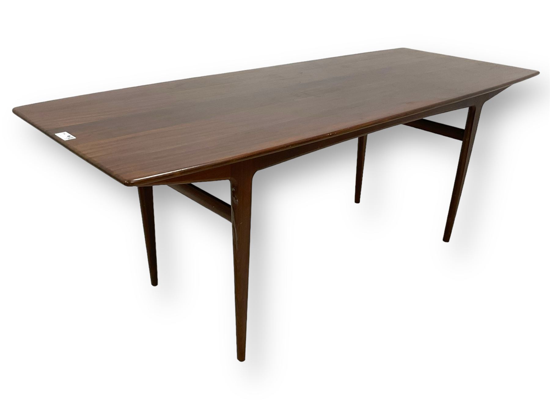 John Herbert for A Younger - mid-20th century teak dining table, curved rectangular top on tapering supports 