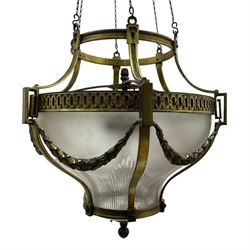 Edwardian brass ceiling light of circular bulbous form, moulded upper band over a guilloche cast central band united by shaped strapping, decorated with fruiting foliage festoons, fitted with frosted and vertical bevelled glass bowl, acanthus cast finial 