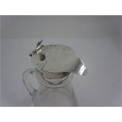 Early 20th century silver mounted whisky tot, the tapering glass body with star cut base and C handle, with silver collar, cover and thumbpiece, hallmarked Hamilton & Co, Sheffield 1916, H11.5cm