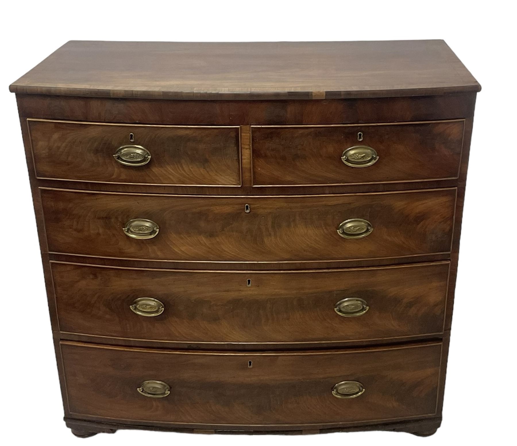 George III mahogany bow-front chest, fitted with two short over three long graduating cock-beaded drawers, on compressed bun feet