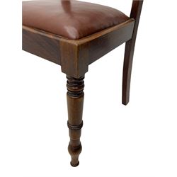 Set of six (4+2) early 19th century mahogany dining chairs, figured bar back over rose and curled leaf carved middle rail, drop-in seats upholstered in brown fabric, on turned front supports 