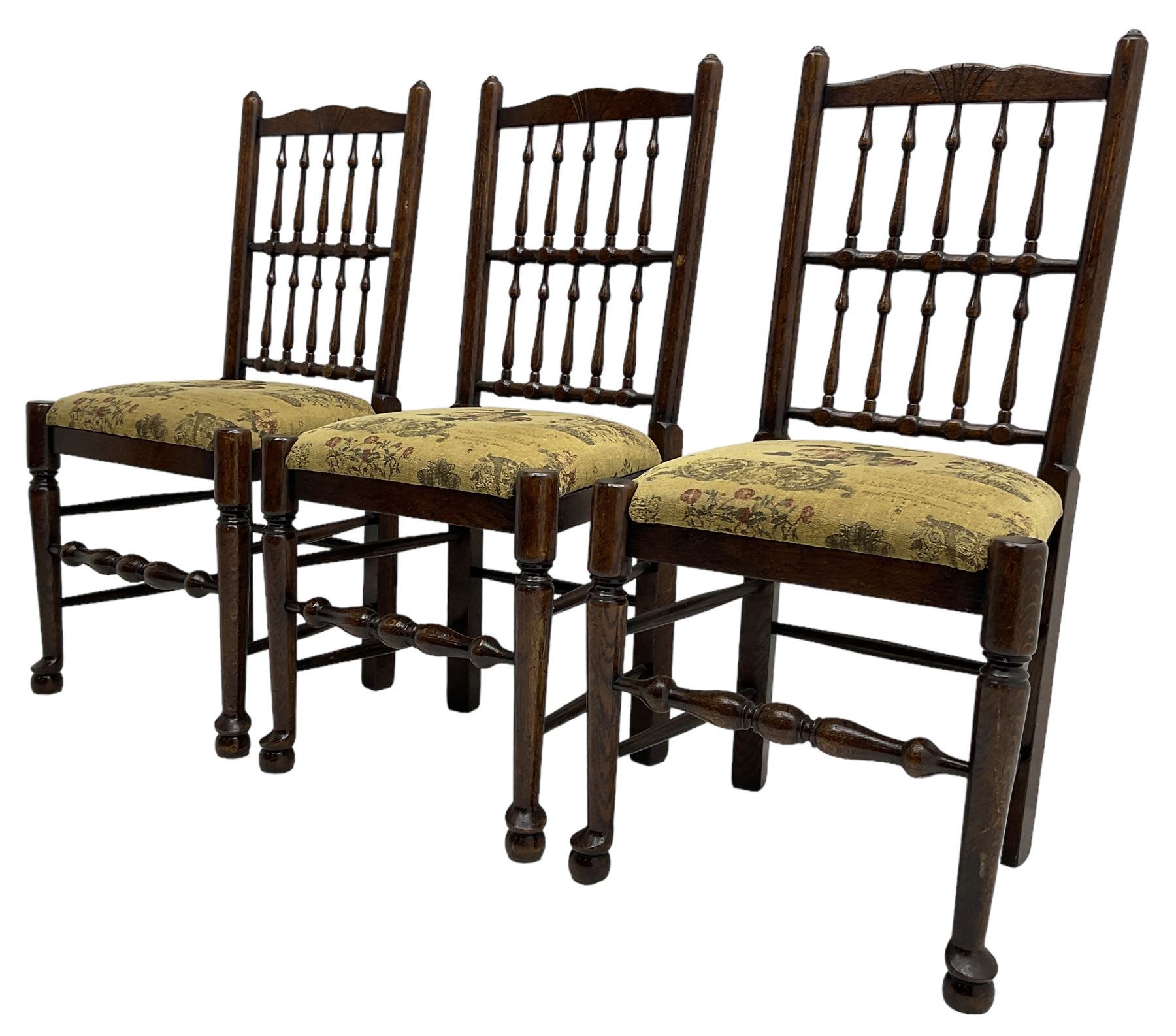 Set of six (4+2) 20th century oak spindle back dining chairs, with upholstered drop-on seat cushions, turned supports joined by turned stretchers