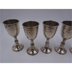 Set of six 1920s silver Kiddush cups, of goblet form with knopped stem, and engraved foliate detail, hallmarked London 1929, maker's mark M.S, H9cm