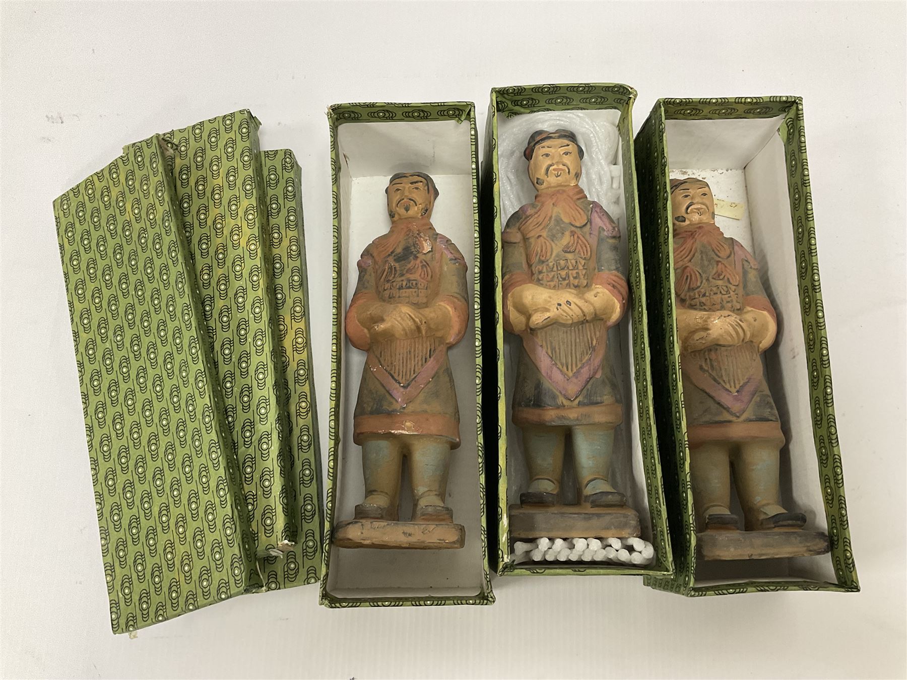 Set of three painted Chinese 'Terracotta Warrior' style figures, H20cm