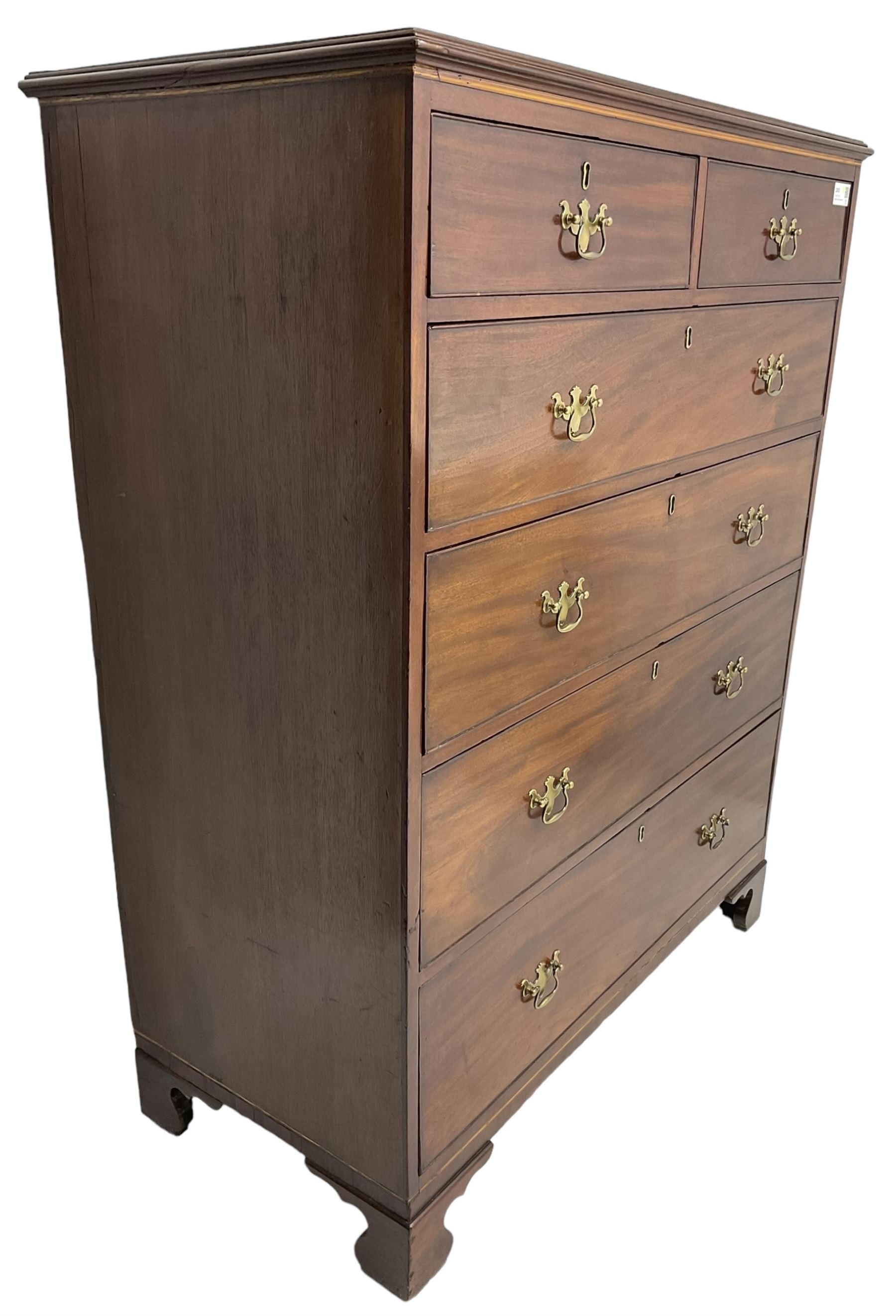 George III mahogany straight-front chest, rectangular top with reed moulded edge, fitted with two short over four long graduating cock-beaded drawers, on bracket feet