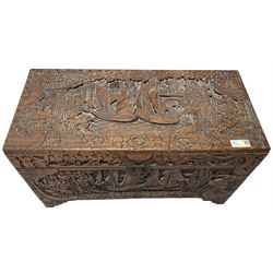 Chinese carved camphor wood blanked chest, rectangular hinged top, carved all over with traditional dragon motifs and junk ships