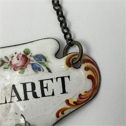 Two late 18th/early 19th century enamel wine labels, each of shaped form, titled 'CLARET', and 'SHERRY' and decorated with floral sprigs and scroll detail upon a white ground, each with suspension chain, each approximately H3.5cm W5cm