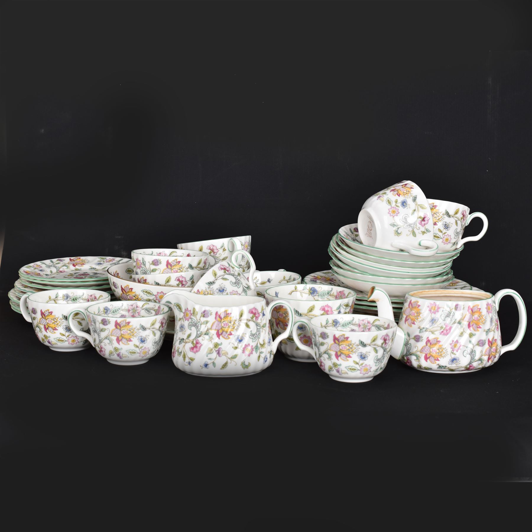 Minton Haddon Hall pattern part tea service, including milk jug, open sucrier, teacups and saucers, dessert plates etc