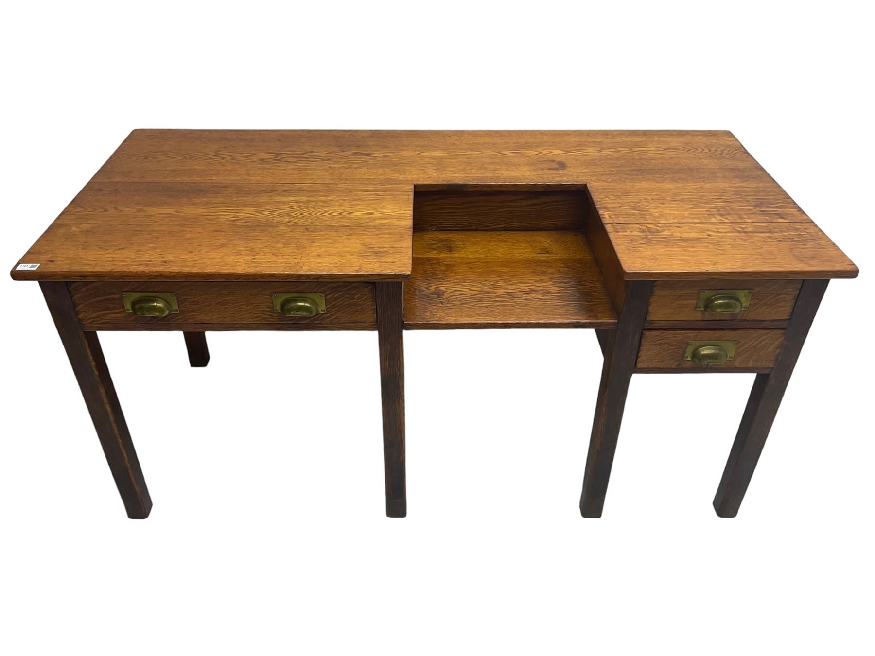 Early 20th century oak clerks desk, fitted with drop centre and drawers, on square supports