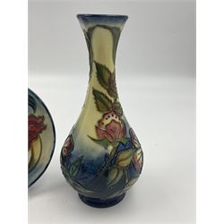 Moorcroft vase, of bottle form, decorated in the Sweet Briar pattern by Rachel Bishop, dated 1997, H7cm, together with a Moorcroft pin dish decorated in the Anna Lily pattern, D12cm (2)