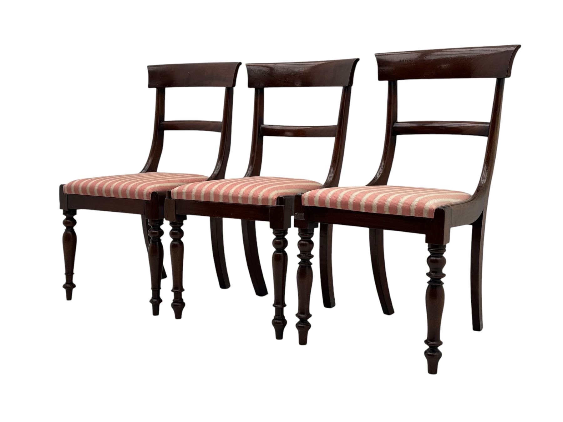 Set of six Victorian mahogany dining chairs, curved bar back over drop-in seat upholstered in striped fabric, on turned front supports