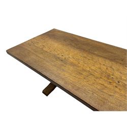 Rabbitman - oak dining table, rectangular adzed top, twin octagonal pillar supports on sledge feet, united by floor stretcher, carved with rabbit signature, by Peter Heap of Wetwang 