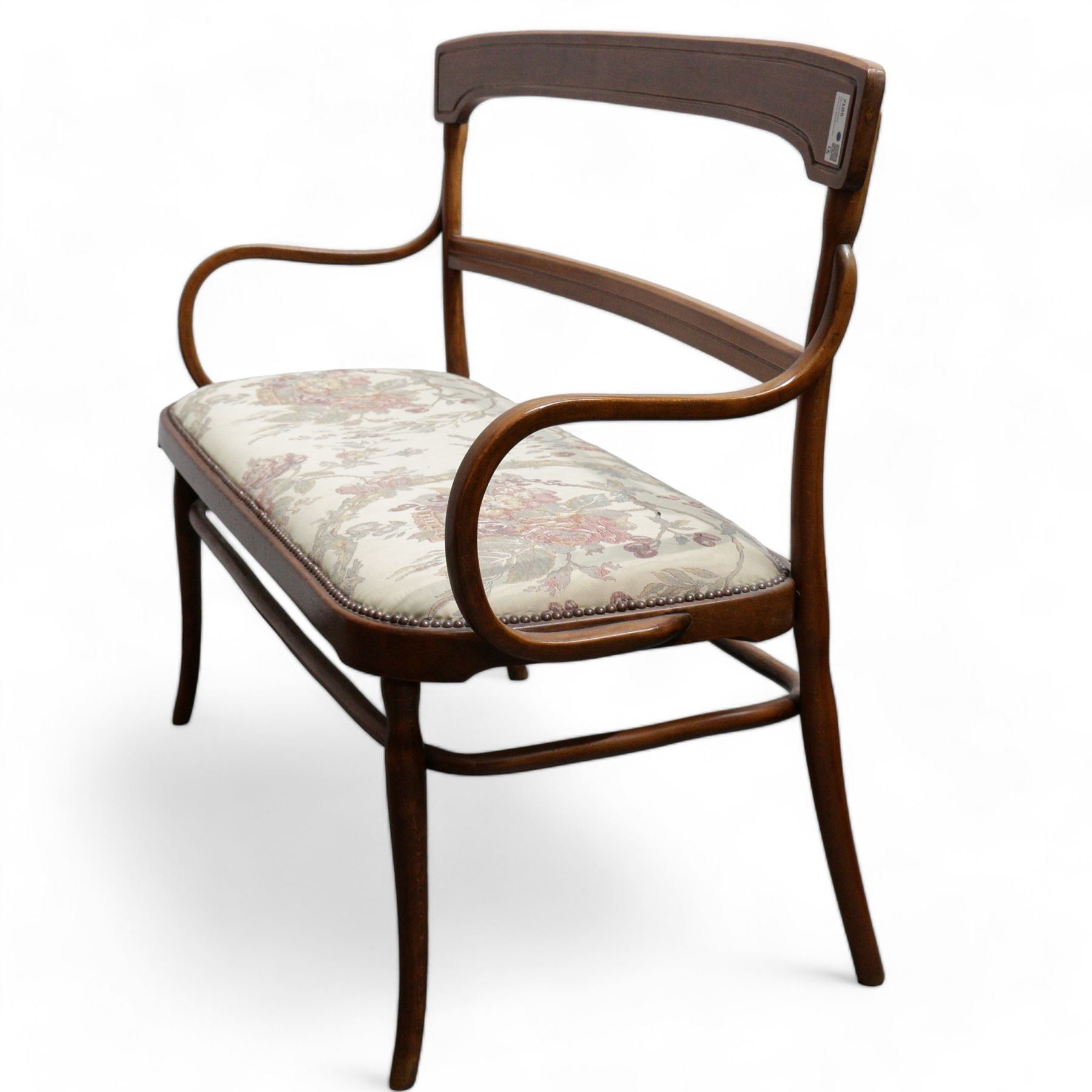 Early 20th century beech framed and bentwood bench, shaped cresting rail over rolled arms, upholstered seat in floral pattern fabric, on turned supports