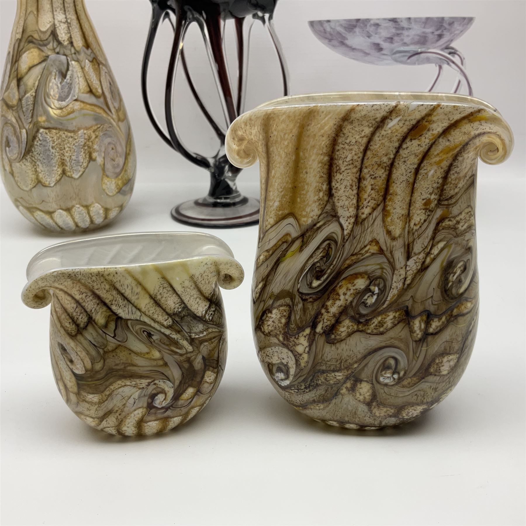 Three Gozo Glass vases of various shapes, decorated with mottled and swirled textured designs in shades of brown, together with two murano  pedestal dishes, largest dish H23cm