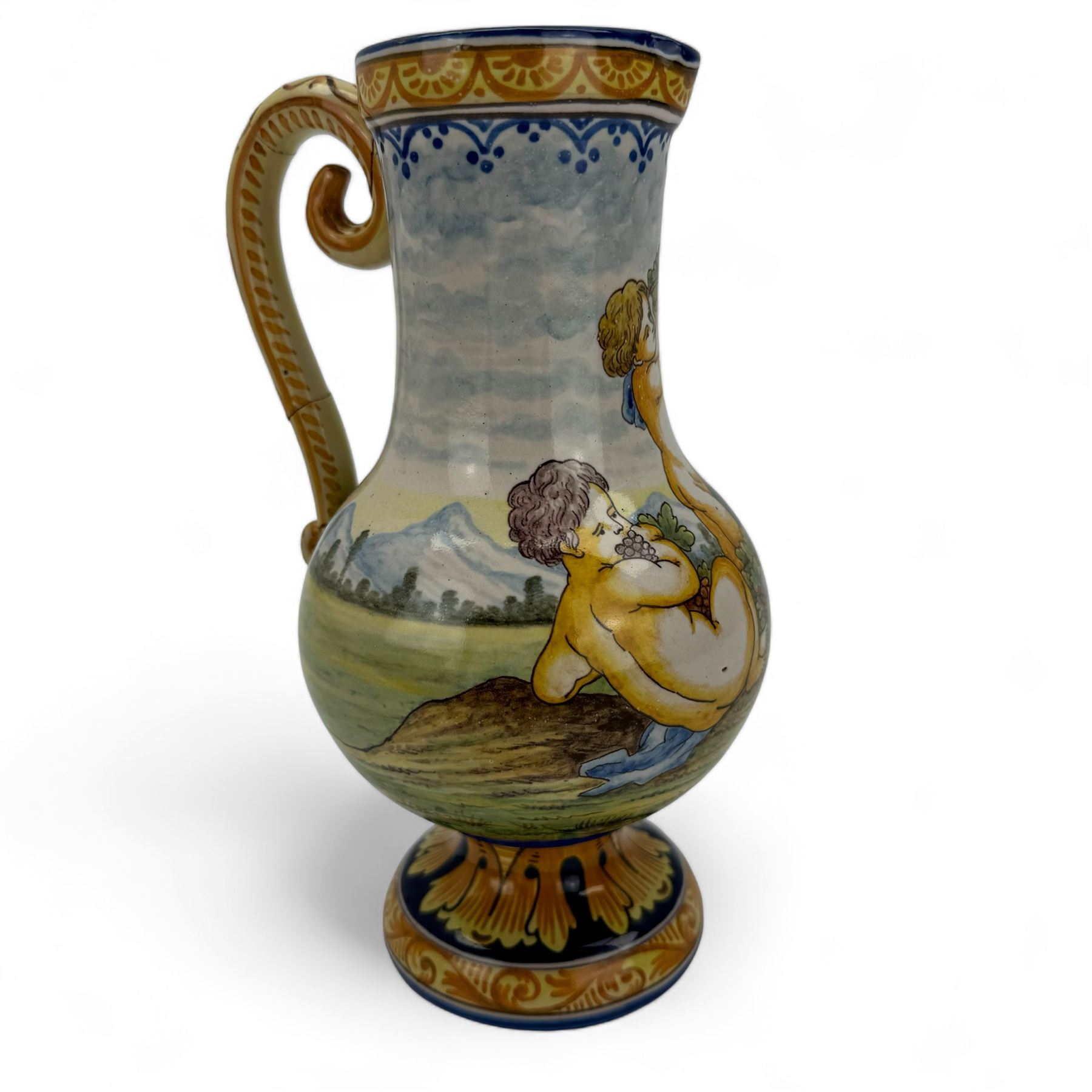 Montagnon Nevers Faience Majolica ewer, decorated with putto in a classical landscape, H23cm