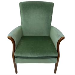 Parker Knoll - mid 20th century green velvet upholstered armchair, high back and cushioned seat, curved wooden armrests, on tapered supports