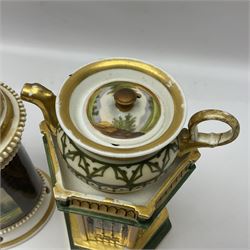 Two 19th century continental teapots and warmers, each teapot upon a cylindrical warming base, one in the form of a hexagon turret, the other hand painted with a figural plaque, largest H24cm